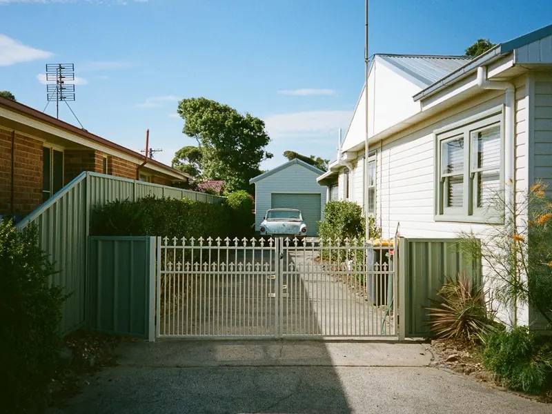 Colorbond side fence with a double driveway gate