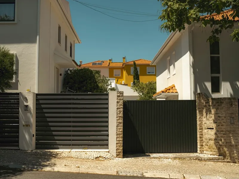 Modern slatted pedestrian and driveway gates